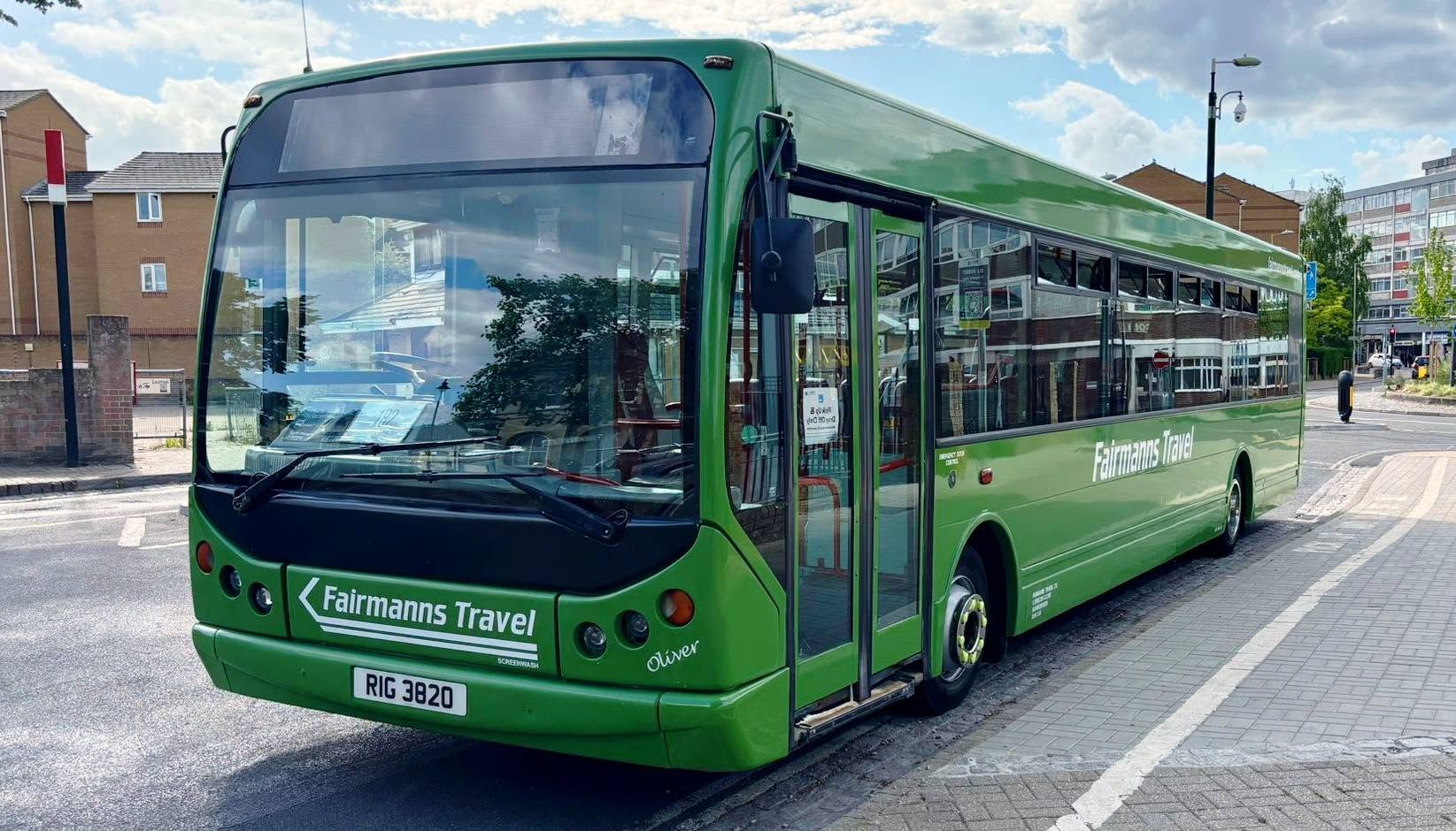 Green Fairmanns Travel service bus